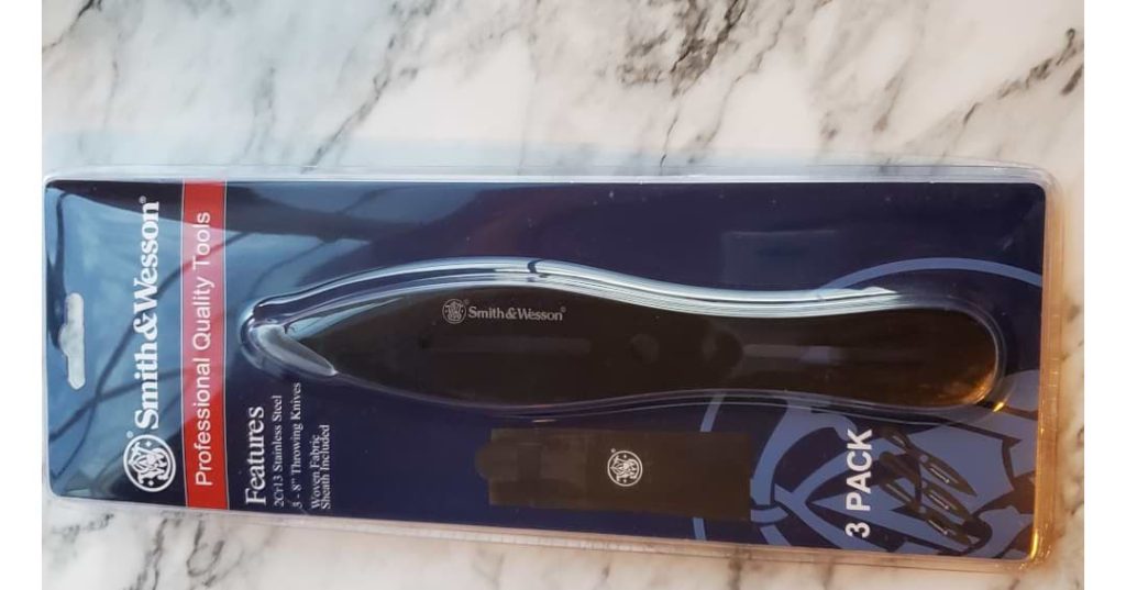 A 3 count package of black throwing knives